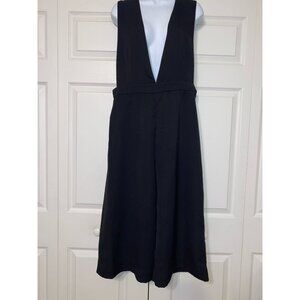 Jumpsuit With Deep V-Neckline & Wide-Leg Design For A Chic Look